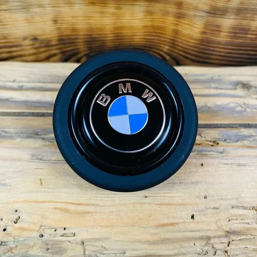 BMW car horn button with plastic housing for fixing horn not working issue