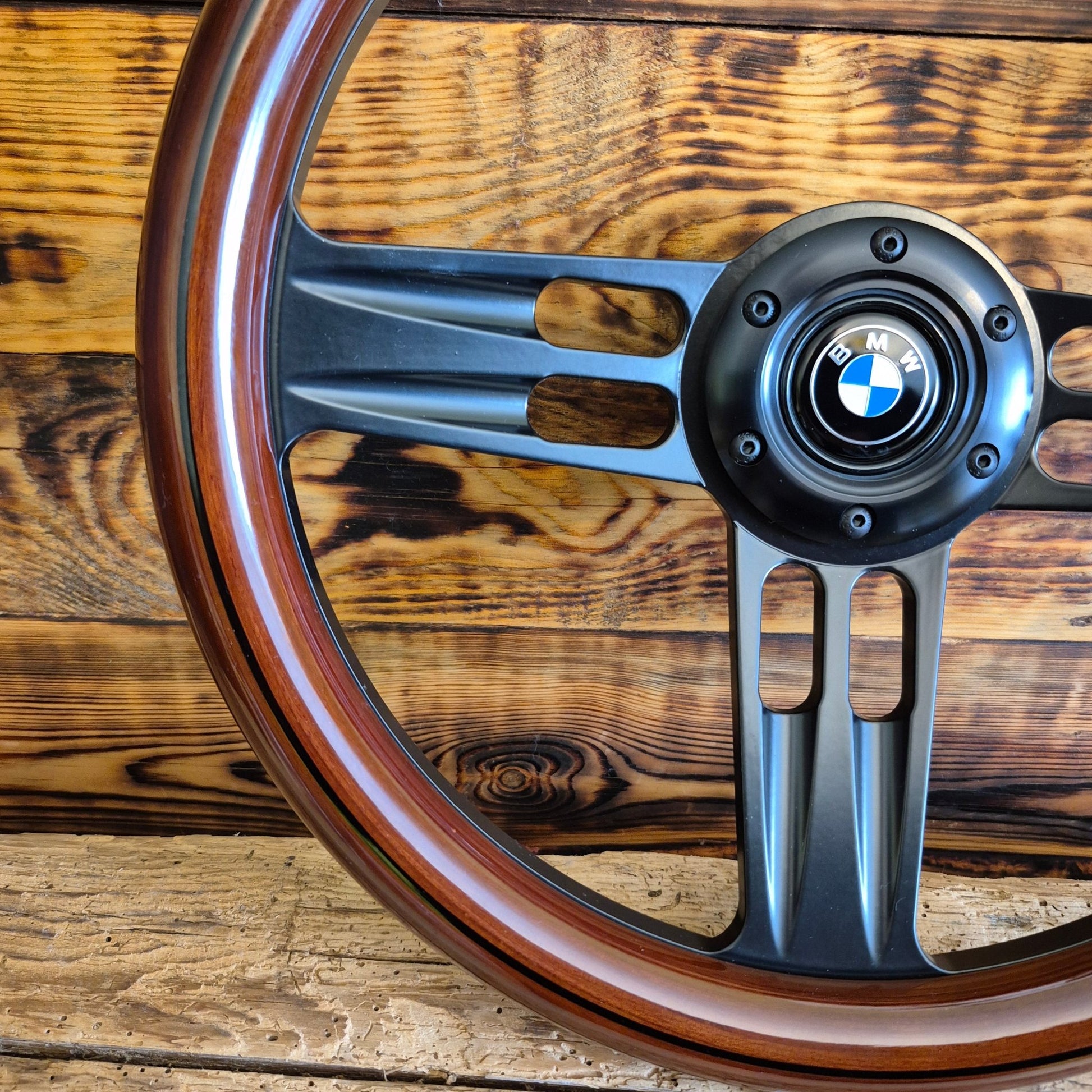 14 inch wood steering wheel for bmw with black metal spokes and classic BMW logo center view