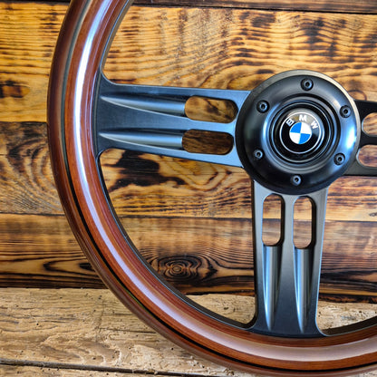 14 inch wood steering wheel for bmw with black metal spokes and classic BMW logo center view