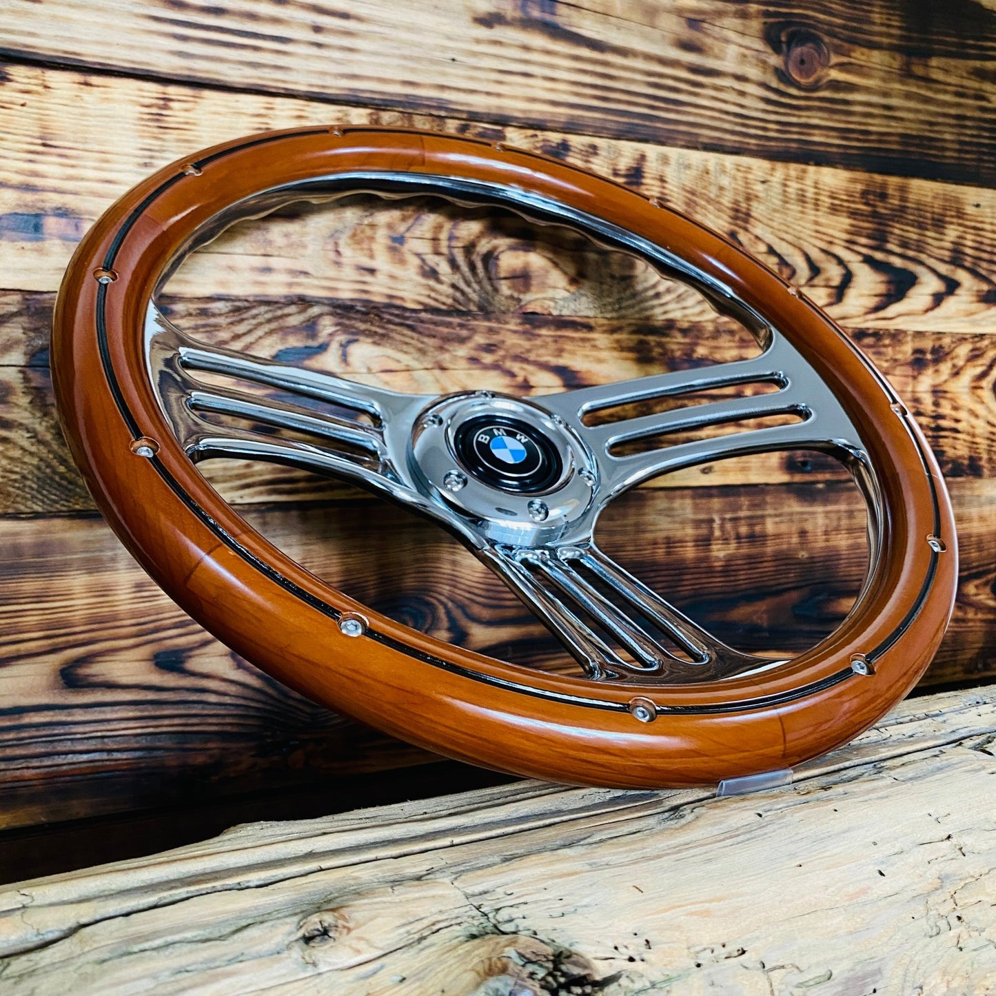14 inch wood steering wheel with polished metal spokes and BMW center emblem for bmw steering wheel fitment front view