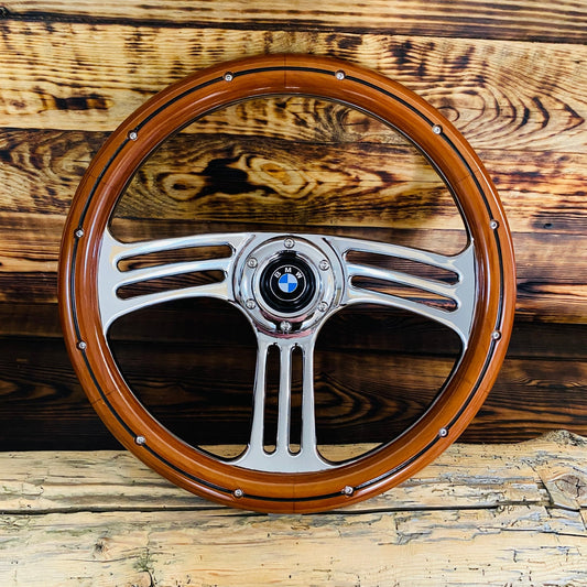 14 inch wood steering wheel with polished metal spokes and BMW logo center for BMW vehicles front view