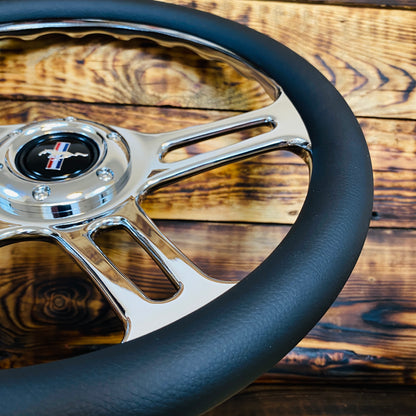 14 inch leather aftermarket steering wheel for Mustang with chrome spokes and black grip shown from top angle