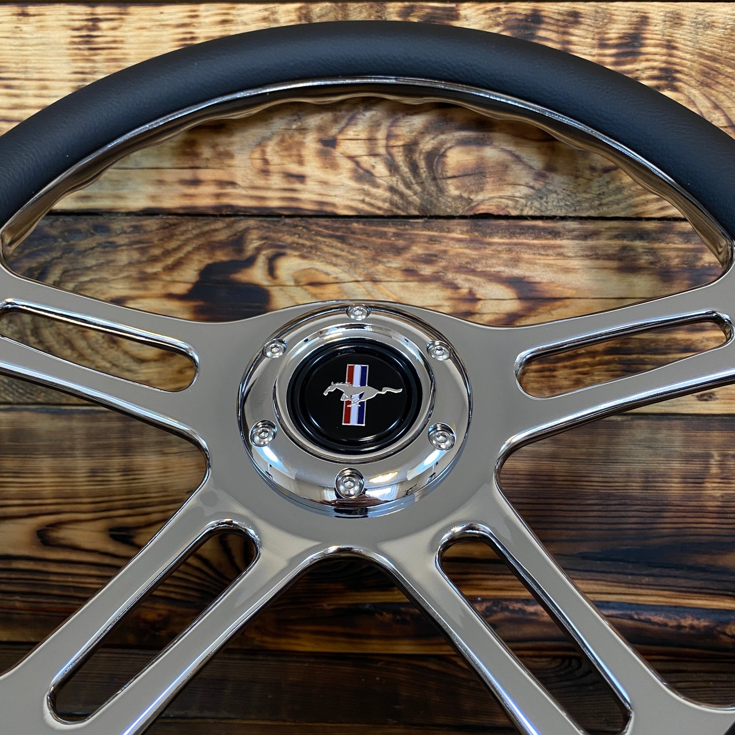 14-inch leather and chrome aftermarket steering wheel for Mustang with center emblem top view