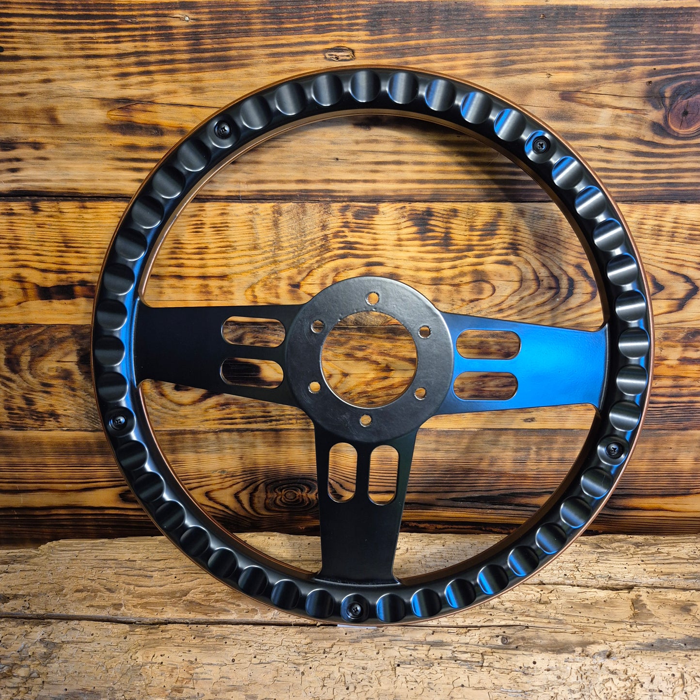 14 inch black metal and wood steering wheel for Ford Mustang front view by Punk Wheels