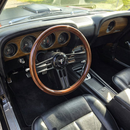 14 inch wood steering wheel for Ford Mustang by Punk Wheels shown installed on vintage car dashboard
