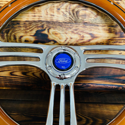 14 inch Ford wood steering wheel with polished metal spokes and blue Ford center cap front view