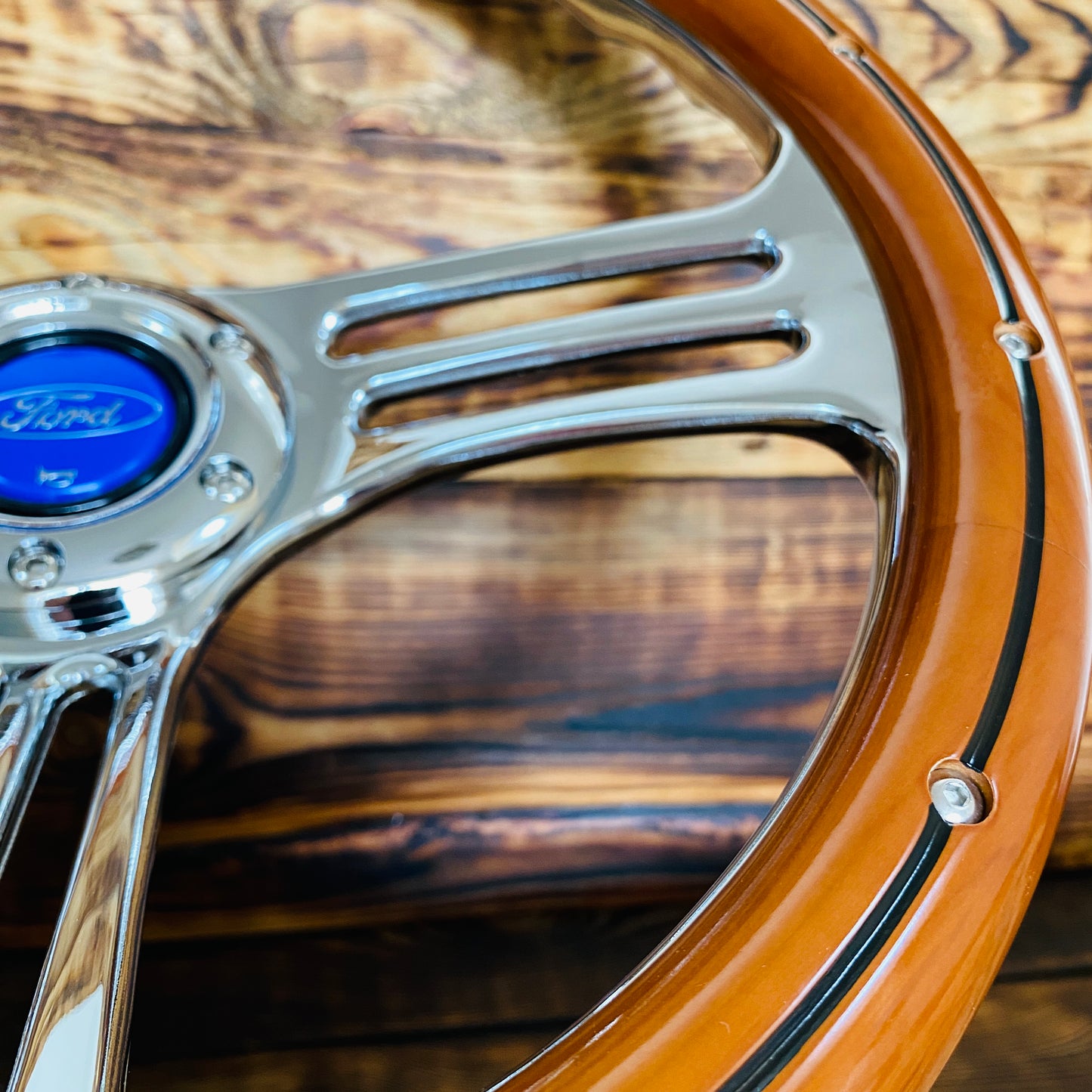 14in Ford wood steering wheel with polished chrome spokes and bolts from Punk Wheels close up view