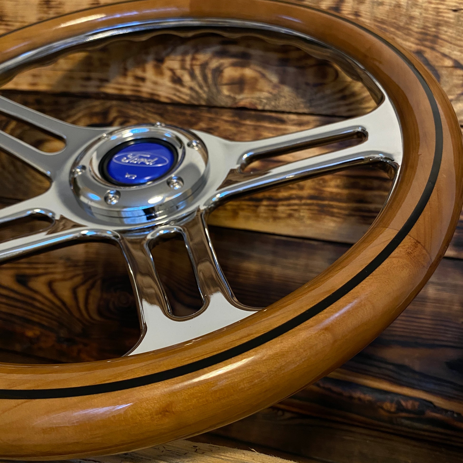 14in wood steering wheel for Ford with polished metal spokes and blue Ford center cap