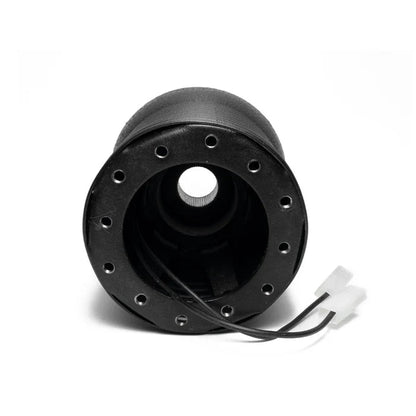 Black metal MERCEDES-BENZ R107 Hub Adapter steering wheel hub adapter with wiring connectors front view