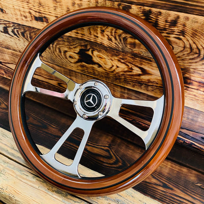 14 inch Mercedes wood steering wheel with polished metal spokes and center emblem front view